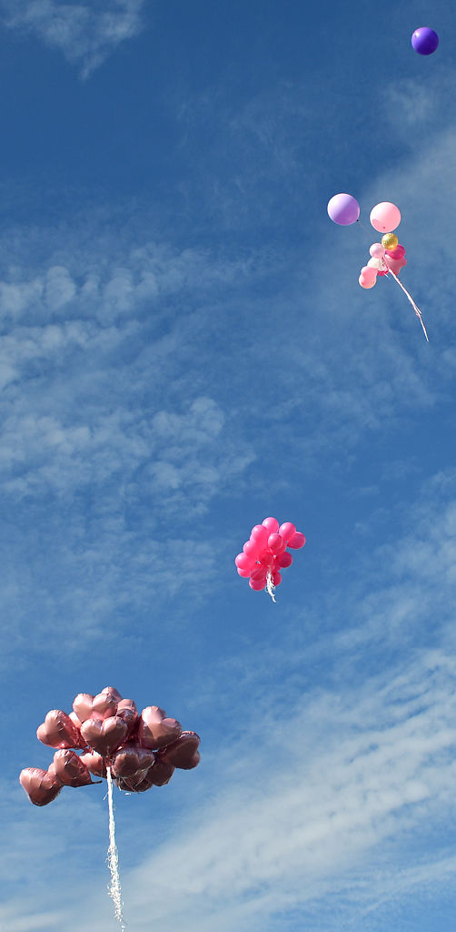 Balloons float away after they were released by friends and family of Gabriella Curry